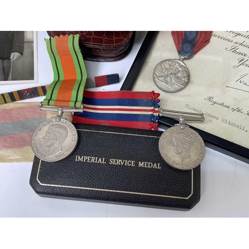 252 - Penzance, Cornwall Interest. Lot comprises a framed and glazed silver Imperial Service Medal with ce... 