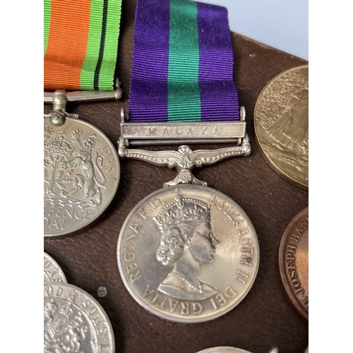 255 - World War Two Trio of Medals and various Horticultural Medallions. Lot comprises a small gas mask? b... 