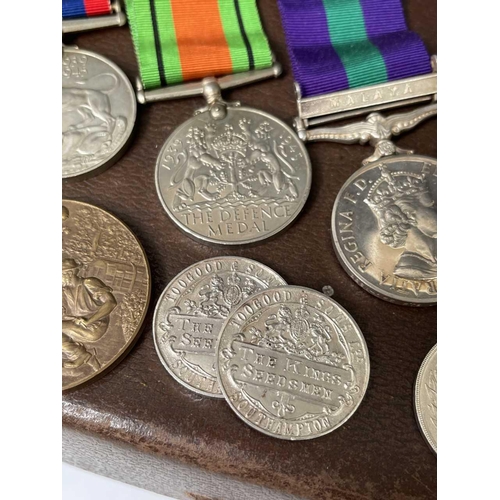 255 - World War Two Trio of Medals and various Horticultural Medallions. Lot comprises a small gas mask? b... 