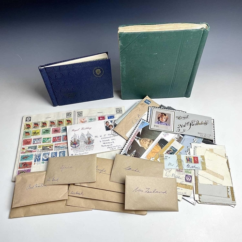 301 - Great Britain and World Stamps. Lot comprises three albums and a tin. The lot includes a well filled... 