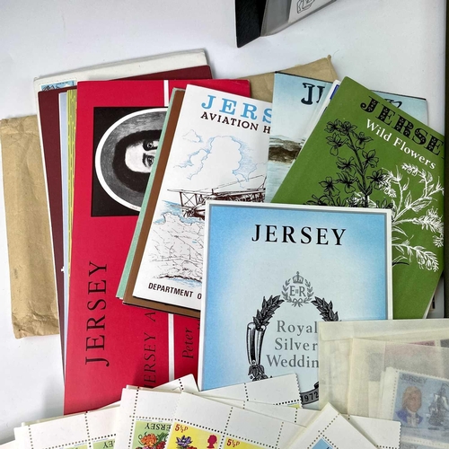 325 - Jersey Mint and Used. Comprising a plastic crate of unmounted mint definitives and commemorative in ... 