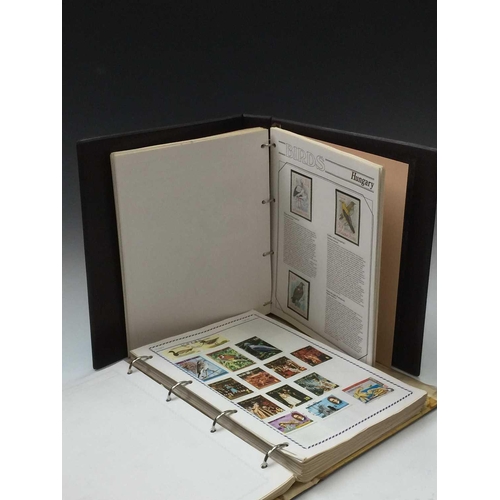 371 - World & Thematic Collections. Lot comprises a 'PHILATELIA' album containing world collection with ma... 