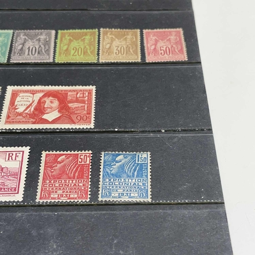 387 - Mint France 1876 to 1930's. Comprising a stockcard of mounted mint definitives and commemoratives fr... 