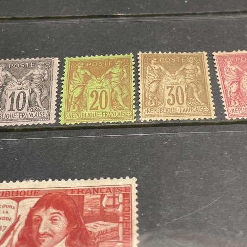 387 - Mint France 1876 to 1930's. Comprising a stockcard of mounted mint definitives and commemoratives fr... 