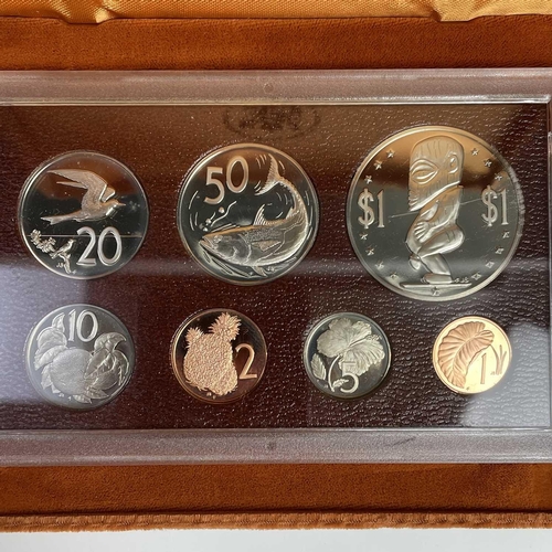 41 - Cook Islands Proof Coinage. Lot comprises 1975 boxed proof set from 1 cent to $1, 1977 boxed $5 silv... 