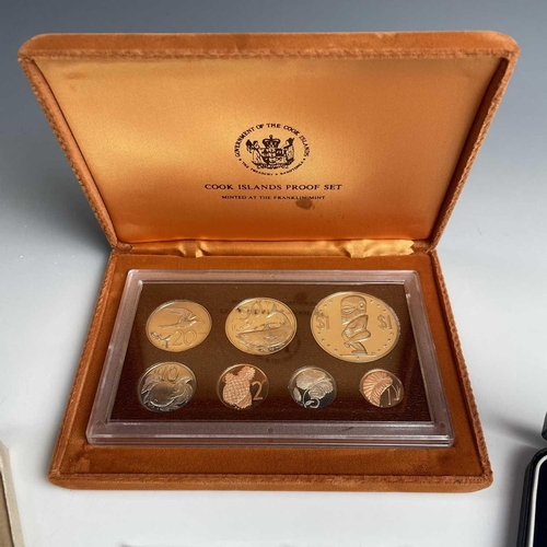 41 - Cook Islands Proof Coinage. Lot comprises 1975 boxed proof set from 1 cent to $1, 1977 boxed $5 silv... 