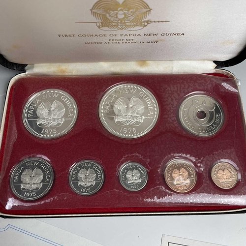 42 - Bahamas and Papua New Guinea Proof Sets. Containing a Bahamas boxed 1974 proof set from 1c to $5 inc... 