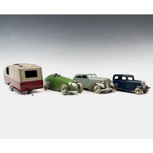 601 - Minicars - 3 Cars and a Caravan. Lot consists of two saloon cars, a racing car No. 6 and a caravan. ... 