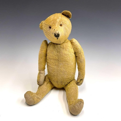 605 - Teddy Bear. An early to mid 20th century growler Teddy Bear plush covered. Approximately 18