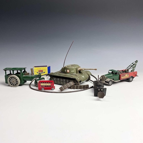 612 - Tin Plate and Matchbox Toys. Comprising: Mini Motor Service Co. breakdown lorry, Minic Road Roller, ... 