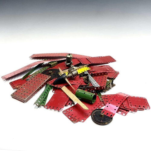 615 - Meccano. A quantity of Meccano - mainly green and red with two propellor motors, plus various access... 