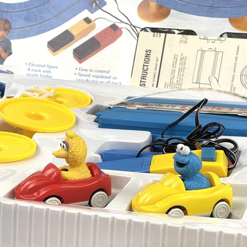 661 - Slot Racing including Scalextric items. Lot comprises 2 boxed racing sets: 