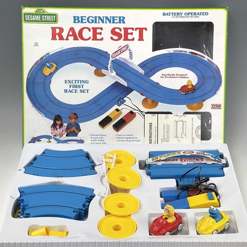 661 - Slot Racing including Scalextric items. Lot comprises 2 boxed racing sets: 