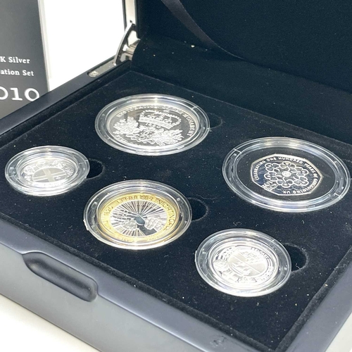 71 - Silver Proof 2010 UK Silver Cased Celebration Set. Comprising Girl Guiding 50p, 2 x £1 Capitals (Lon... 