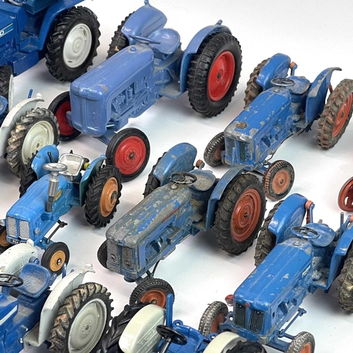 757 - Ford / Fordson Tractors. A box containing 20 Tractors mainly by Britains - various models.