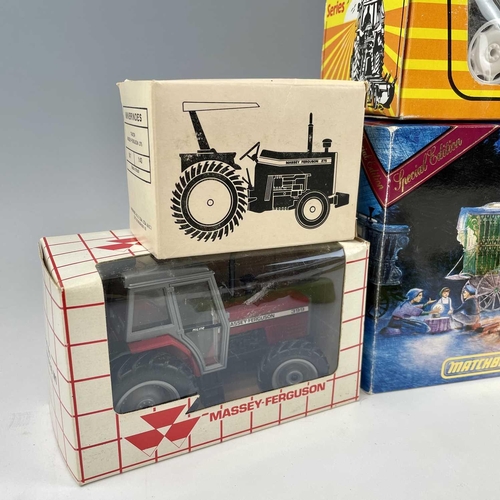 760 - Boxed Tractors, etc. A box containing 7 boxed tractors by Erth, Lone Star, etc. Lot also includes a ... 