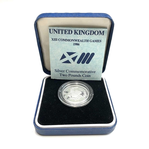 77 - G.B Silver Proof Cased £2 Coins (5 in all). Comprising cased 1986 £2 Commonwealth Games, cased 1989 ... 