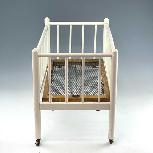 783 - Children's Toy/Dolls Cots (x2), Dolls, etc. Comprising a Triang Toys metal sprung cot of wooden cons... 