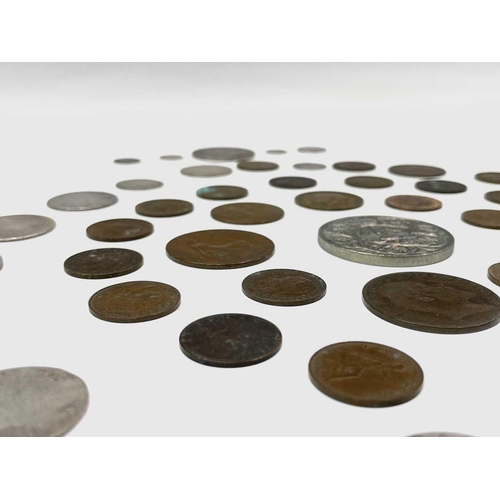 9 - Pre-1920 G.B. Silver Coins. Approximately 90gms of mostly worn or holed early British coins but incl... 