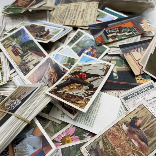 904 - Cigarette and Trade Cards. A very large quantity contained in two boxes, partly sorted includes albu... 