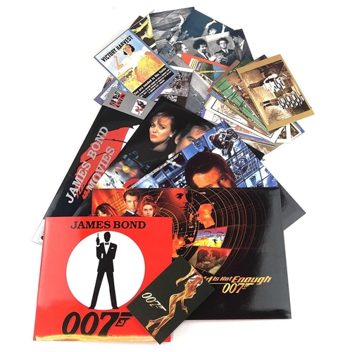 914 - James Bond Phone Cards (x56). A collection of 56 mint phone cards dipicting characters in 'Tomorrow ... 