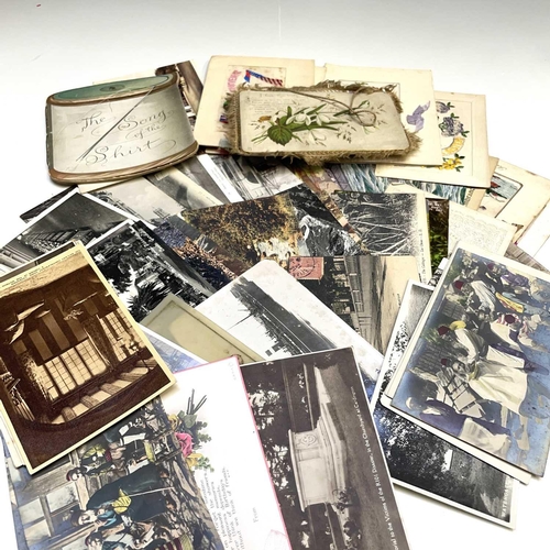 921 - Postcards and Greeting Cards. A collection of 50 plus postcards including 10 World War I silk postca... 