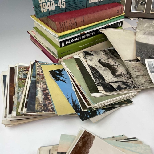 922 - Postcards, Postal History Reference Books, Photographs, etc. Containing approximately 50 early 20th ... 