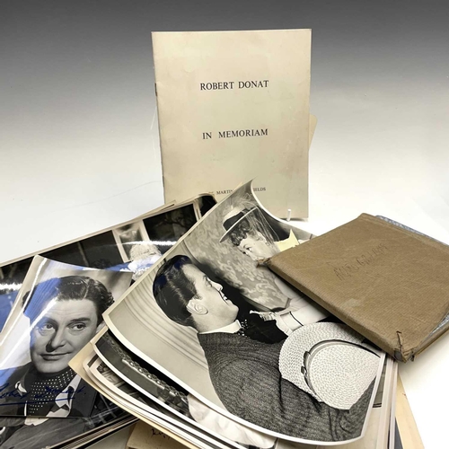 923 - Robert Donat Filmstar and Associated Photgraphs. The lot includes a quantity of official studio phot... 