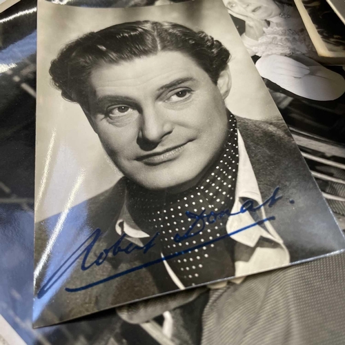 923 - Robert Donat Filmstar and Associated Photgraphs. The lot includes a quantity of official studio phot... 