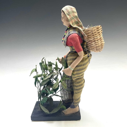 927 - Indian Lady Tea Picker Doll - ? Advertising Interest. A cloth Indian lady tea picker with basket and... 