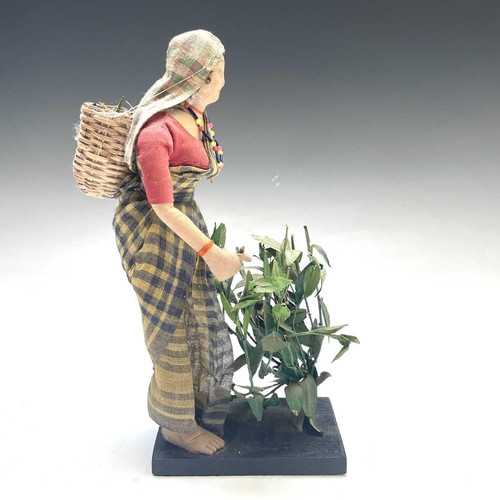 927 - Indian Lady Tea Picker Doll - ? Advertising Interest. A cloth Indian lady tea picker with basket and... 