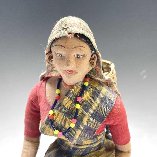 927 - Indian Lady Tea Picker Doll - ? Advertising Interest. A cloth Indian lady tea picker with basket and... 