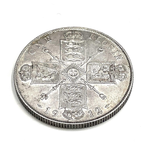 94 - G.B and Foreign Coinage. Lot comprises - Silver coinage: GB 1889 4/- coin, 1912 2/-, 1887 Jubilee he... 