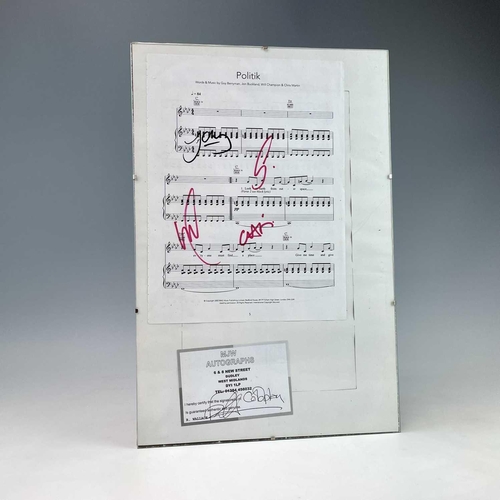 941 - Coldplay Autograph. A framed personally signed score for 