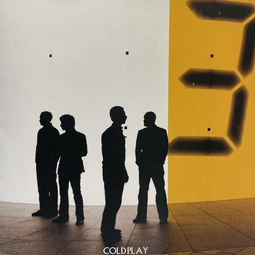 942 - Coldplay Autograph. An advertising display card for 