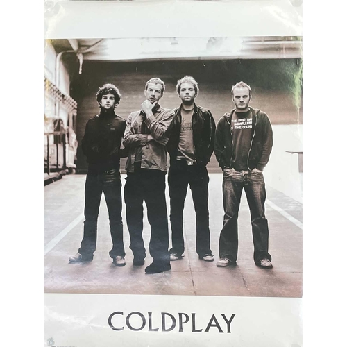 942 - Coldplay Autograph. An advertising display card for 