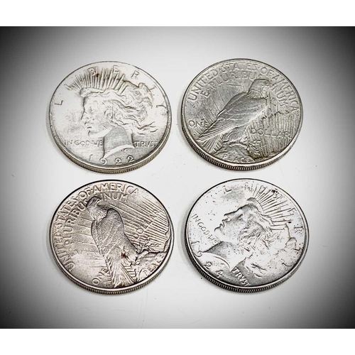 99 - USA Peace Silver Dollars - A run of four US Peace Silver Dollars: 1922; 1923.S.;1924;1926.S.; All in... 