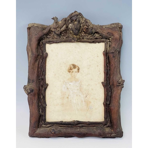 1453 - A 19th century carved wood rustic frame, probably hawthorne, a watercolour of a girl within, signed ... 