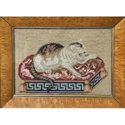 2800 - A Victorian Berlin woolwork picture of a cat, seated on a cushion, with Greek key lower border, cont... 