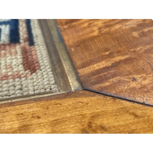 2800 - A Victorian Berlin woolwork picture of a cat, seated on a cushion, with Greek key lower border, cont... 