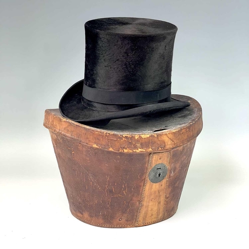 2804 - A Victorian top hat, labelled for D.Parsley, No 20, Clare Street, Bristol, in leather case, overall ... 