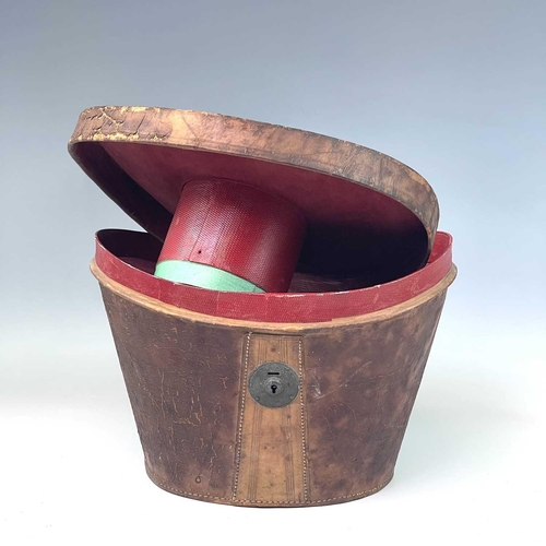 2804 - A Victorian top hat, labelled for D.Parsley, No 20, Clare Street, Bristol, in leather case, overall ... 