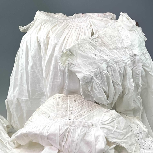 2810 - A 19th century cotton child's nightgown together with six other nightgowns and christening robes. (7... 