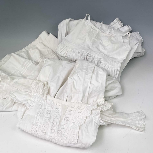2811 - An early 20th century child's nightgown together with four other christening robes and nightgown and... 