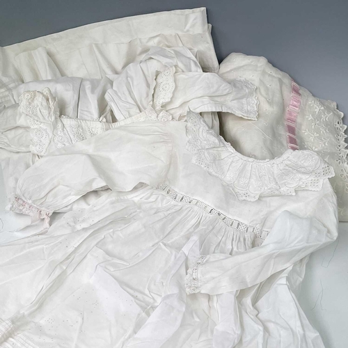 2811 - An early 20th century child's nightgown together with four other christening robes and nightgown and... 