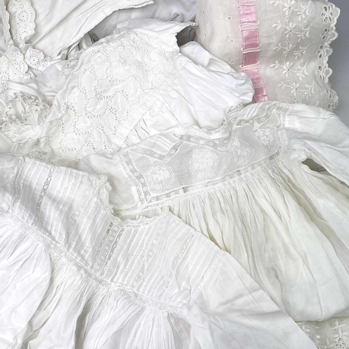 2811 - An early 20th century child's nightgown together with four other christening robes and nightgown and... 