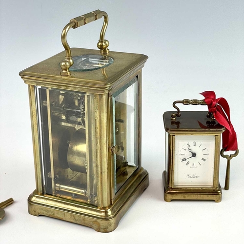 2901 - A miniature Swiss brass carriage timepiece, 20th century, by M Norman, height 6.5cm, together with a... 