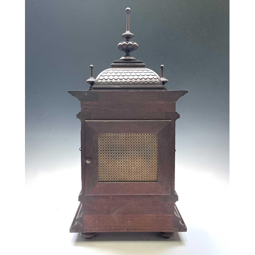 2903 - A German Winterhalder and Hofmeier oak architectural bracket clock, with turned finials and matt bra... 