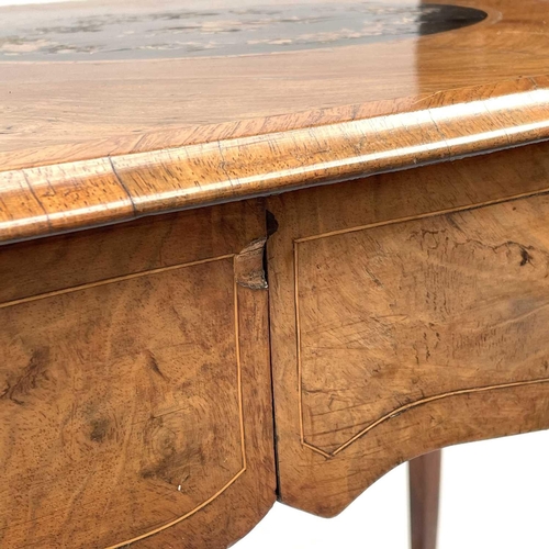 3004 - A Late Victorian walnut marquetry and brass mounted shaped table, the inlaid central decoration of s... 