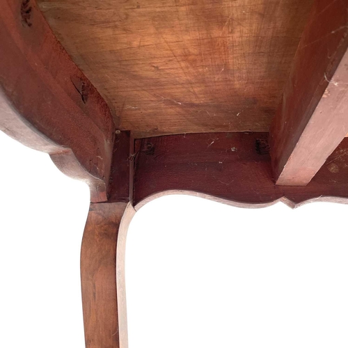 3004 - A Late Victorian walnut marquetry and brass mounted shaped table, the inlaid central decoration of s... 